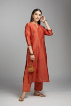 Rust straight kurta set with all-over dull gold zari embroidery