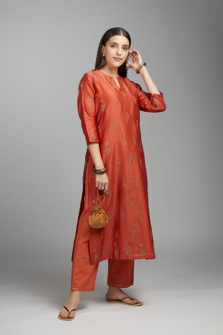 Rust straight kurta set with all-over dull gold zari embroidery