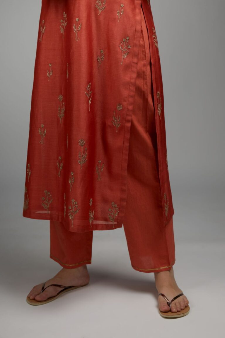 Rust straight kurta set with all-over dull gold zari embroidery