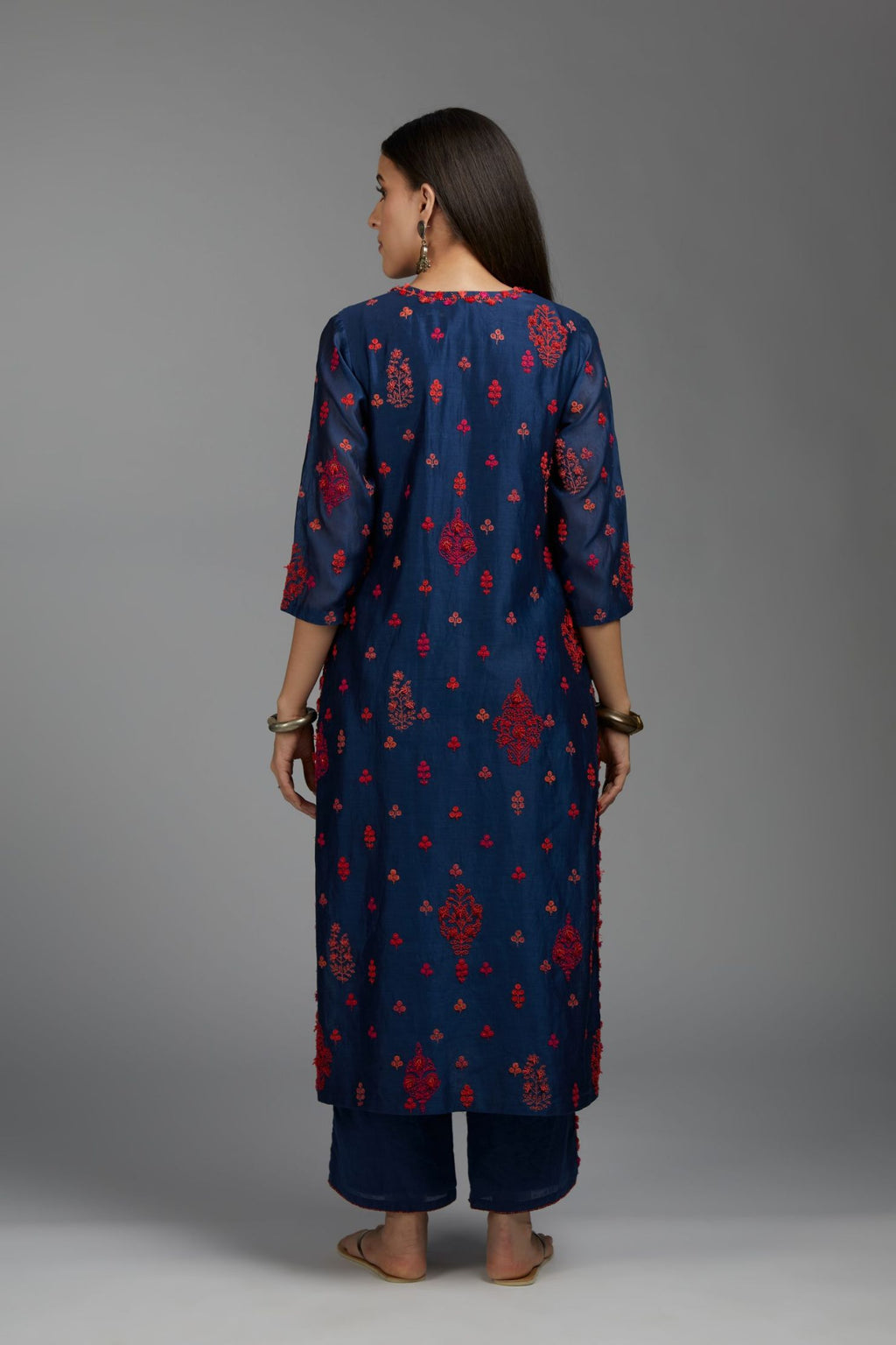 Indigo blue straight kurta set with all-over multi coloured Dori embroidery and delicate bird and tassel detailing