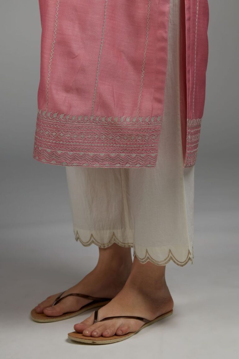 Pink straight kurta set with all-over silver zari embroidery and V neckline with one functional button in front