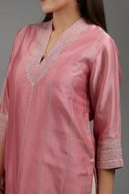 Pink straight kurta set with all-over silver zari embroidery and V neckline with one functional button in front