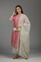 Pink straight kurta set with all-over silver zari embroidery and V neckline with one functional button in front