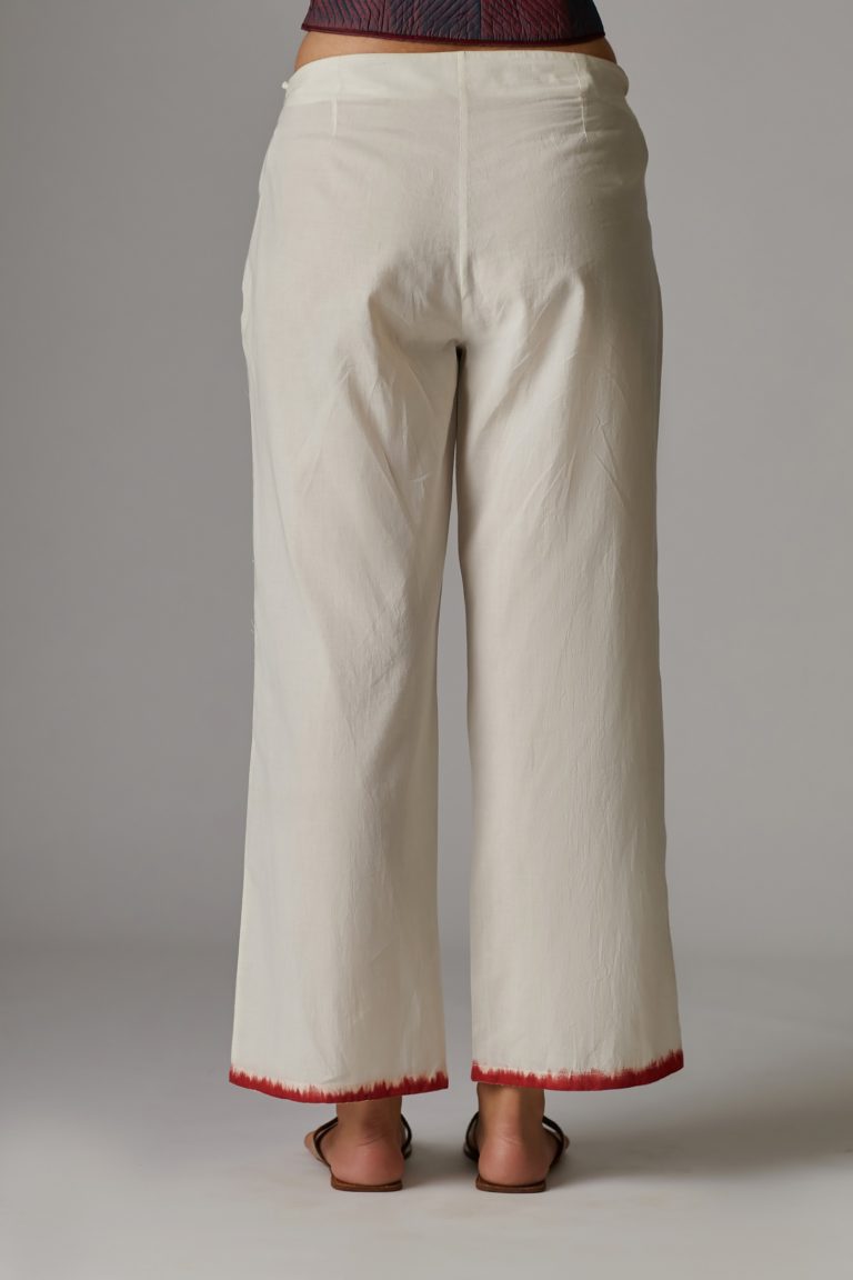 Off white straight pant with hand block print at the bottom