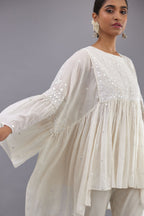 Off white cotton easy fit top with flared sleeves and hem, paired with off white cotton comfortable fit pant with all-over elasticated waistband.