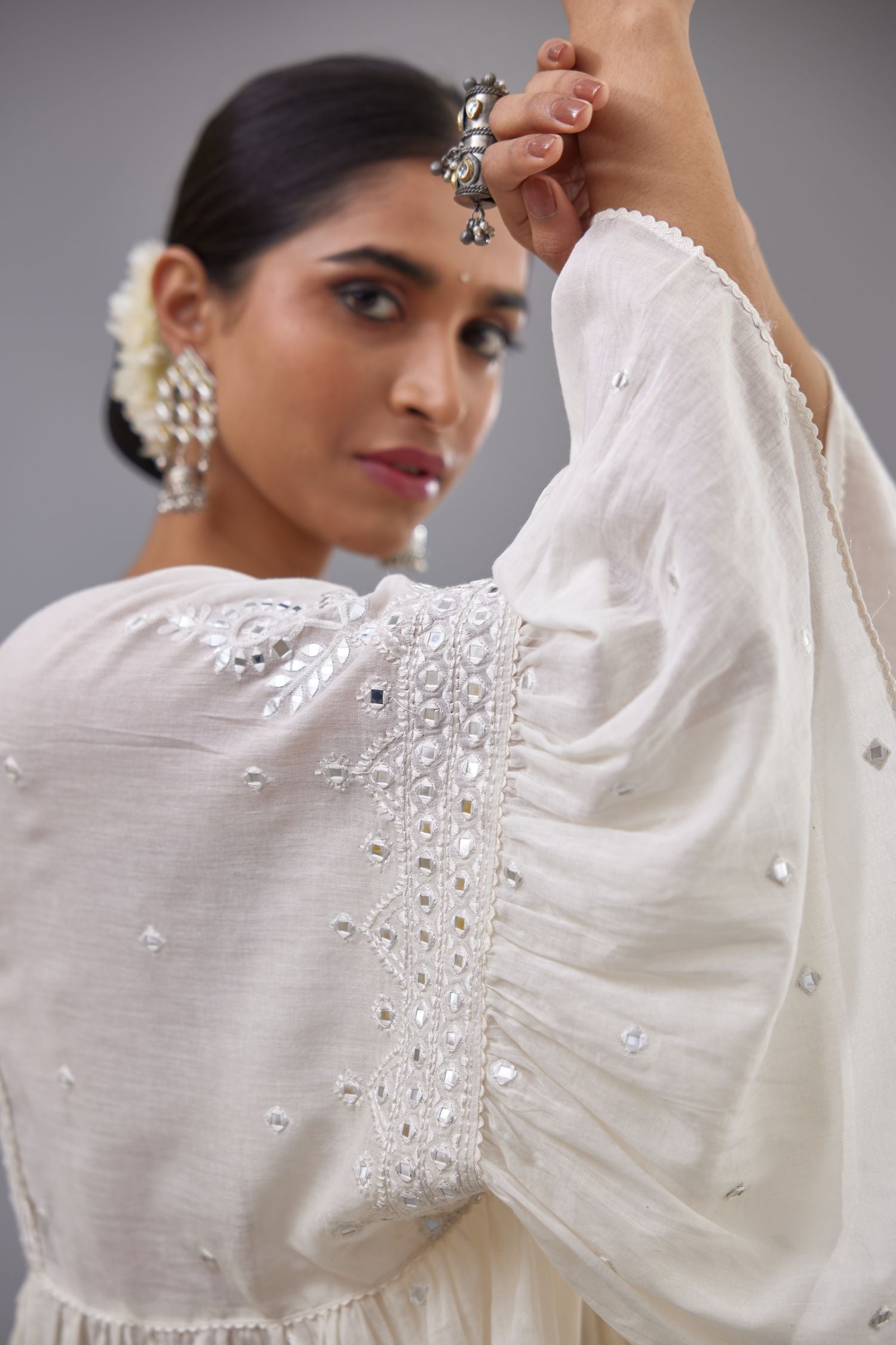 Off white cotton easy fit top with flared sleeves and hem, paired with off white cotton comfortable fit pant with all-over elasticated waistband.