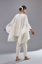 Off white cotton easy fit top with flared sleeves and hem, paired with off white cotton comfortable fit pant with all-over elasticated waistband.