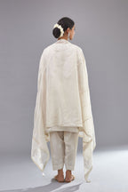 Off white silk Chanderi short panelled kurta set with off-white thread and mirror embroidery.