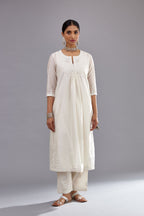 Off white silk Chanderi straight long kurta dress set with off-white thread and mirror embroidery.