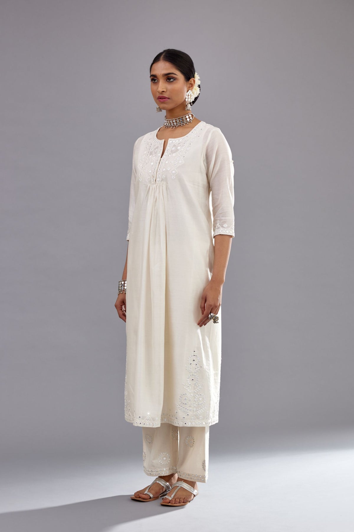 Off white silk Chanderi straight long kurta dress set with off-white thread and mirror embroidery.