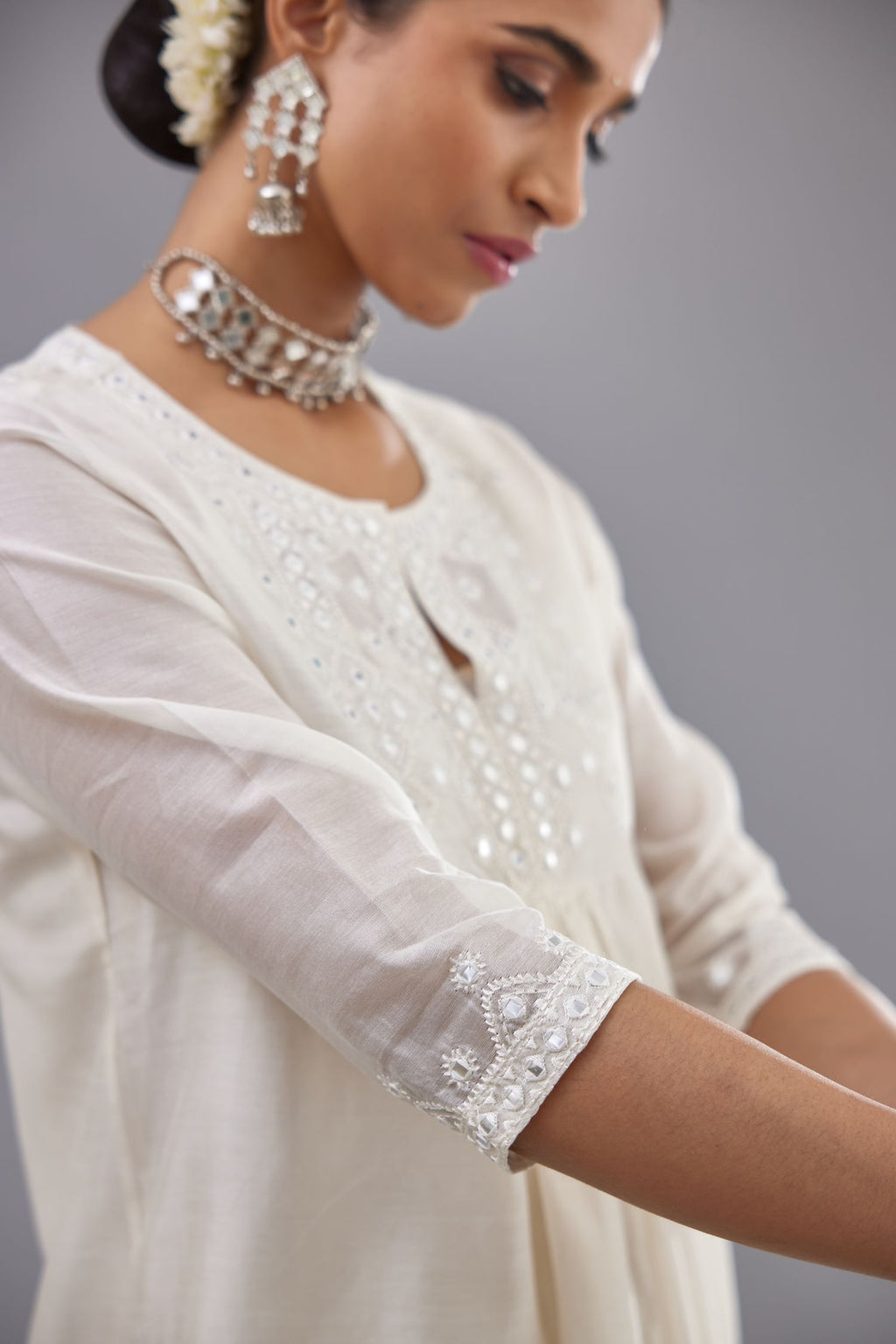 Off white silk Chanderi straight long kurta dress set with off-white thread and mirror embroidery.