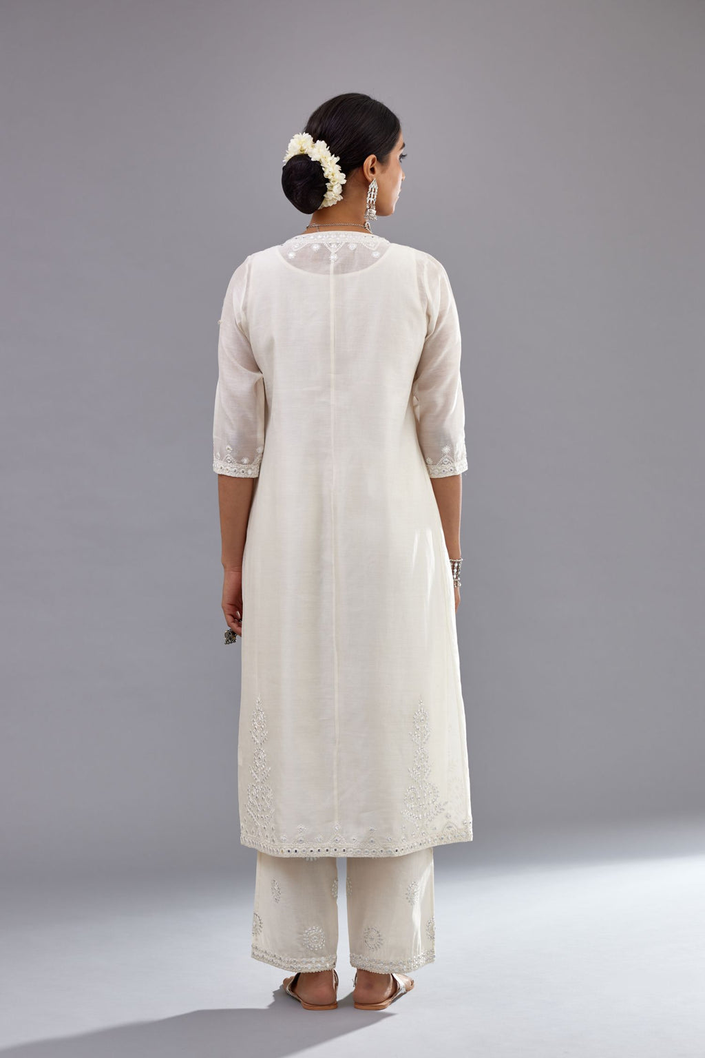 Off white silk Chanderi straight long kurta dress set with off-white thread and mirror embroidery.