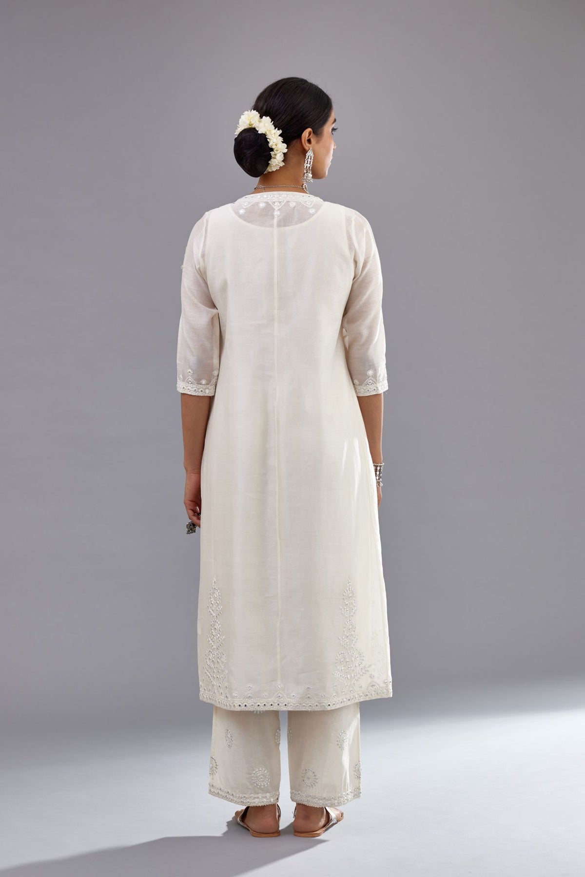 Off white silk Chanderi straight long kurta dress set with off-white thread and mirror embroidery.