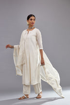 Off white silk Chanderi straight long kurta dress set with off-white thread and mirror embroidery.