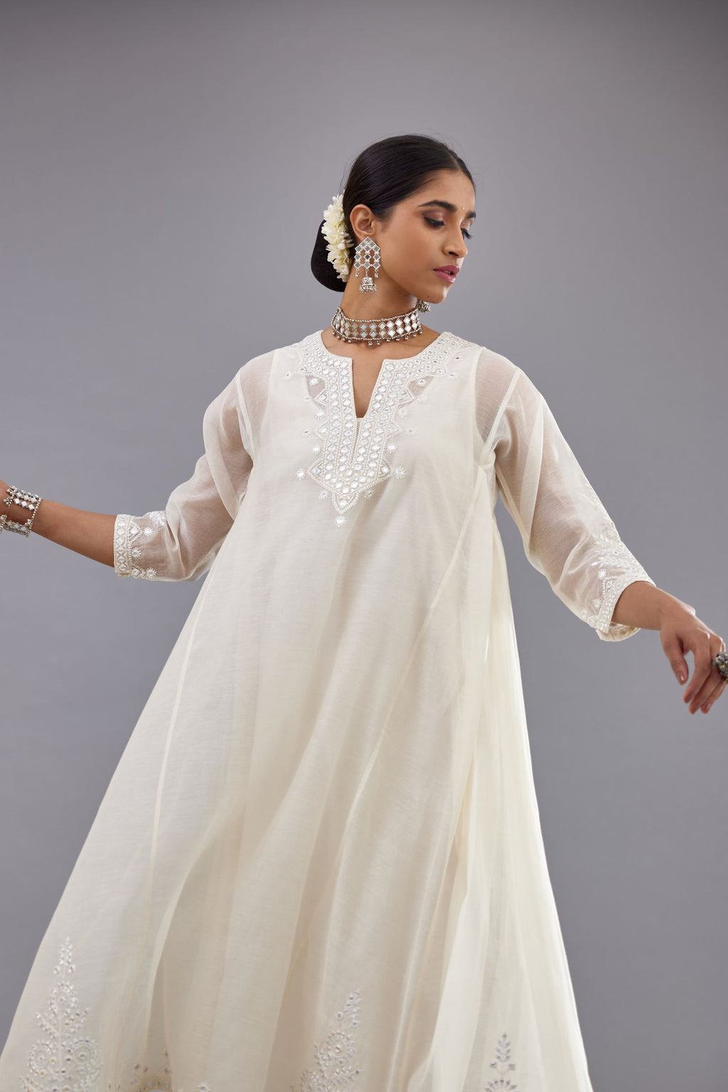 Off white Cotton Chanderi panelled and asymmetric hem long kurta set with off-white thread and mirror embroidery.