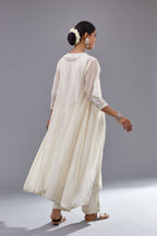 Off white Cotton Chanderi panelled and asymmetric hem long kurta set with off-white thread and mirror embroidery.