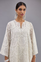 Off white short easy fit, straight hem kurta set with all-over trellis jaal appliqué, highlighted with sequins.