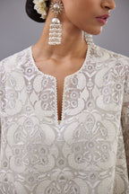 Off white short easy fit, straight hem kurta set with all-over trellis jaal appliqué, highlighted with sequins.