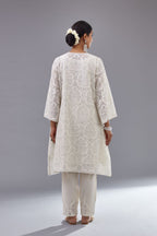 Off white short easy fit, straight hem kurta set with all-over trellis jaal appliqué, highlighted with sequins.