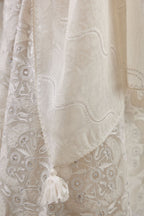 Off white short easy fit, straight hem kurta set with all-over trellis jaal appliqué, highlighted with sequins.
