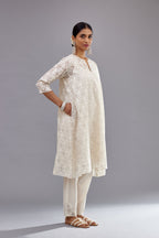 Off white short easy fit, straight hem kurta set with all-over trellis jaal appliqué, highlighted with sequins.