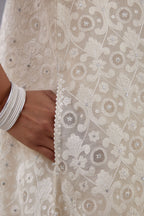 Off white short easy fit, straight hem kurta set with all-over trellis jaal appliqué, highlighted with sequins.