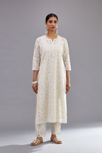 Off white straight kurta set with all-over cotton appliqué trellis jaal, highlighted with sequins.