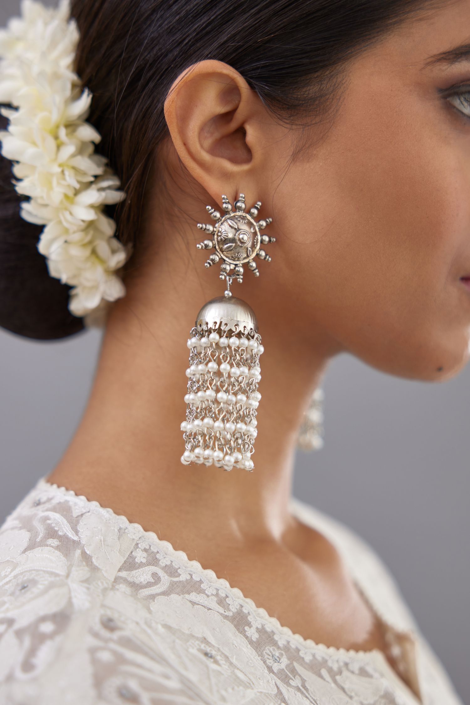 Off white straight kurta set with all-over cotton appliqué trellis jaal, highlighted with sequins.