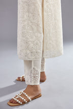 Off white straight kurta set with all-over cotton appliqué trellis jaal, highlighted with sequins.