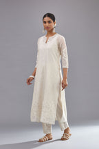 Off white cotton chanderi straight kurta set with cotton appliqué, highlighted with sequins.