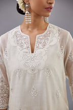 Off white cotton chanderi straight kurta set with cotton appliqué, highlighted with sequins.