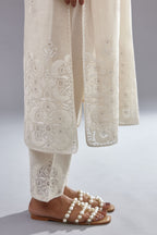 Off white cotton chanderi straight kurta set with cotton appliqué, highlighted with sequins.