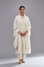 Off white silk chanderi straight kurta set with appliqué trellis jaal in center panel and small assorted flowers embroidery at side panells.