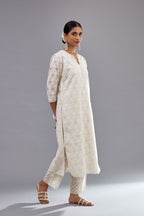Off white straight kurta set with all-over cotton appliqué trellis jaal, highlighted with sequins.