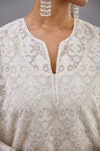 Off white straight kurta set with all-over cotton appliqué trellis jaal, highlighted with sequins.