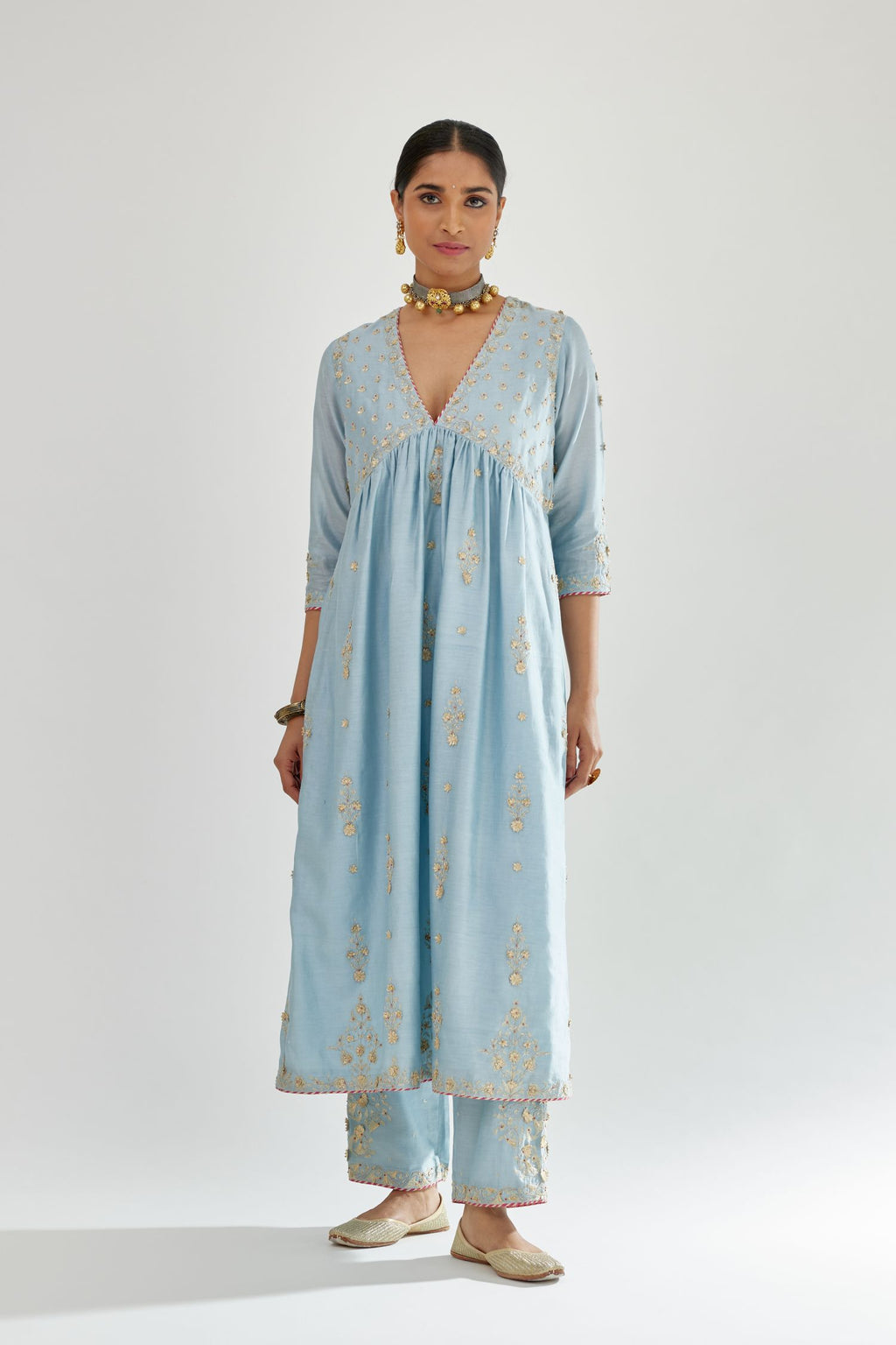 Blue silk chanderi kurta-dress set with zari, dori and gota embroidery, highlighted with contrast bead work.