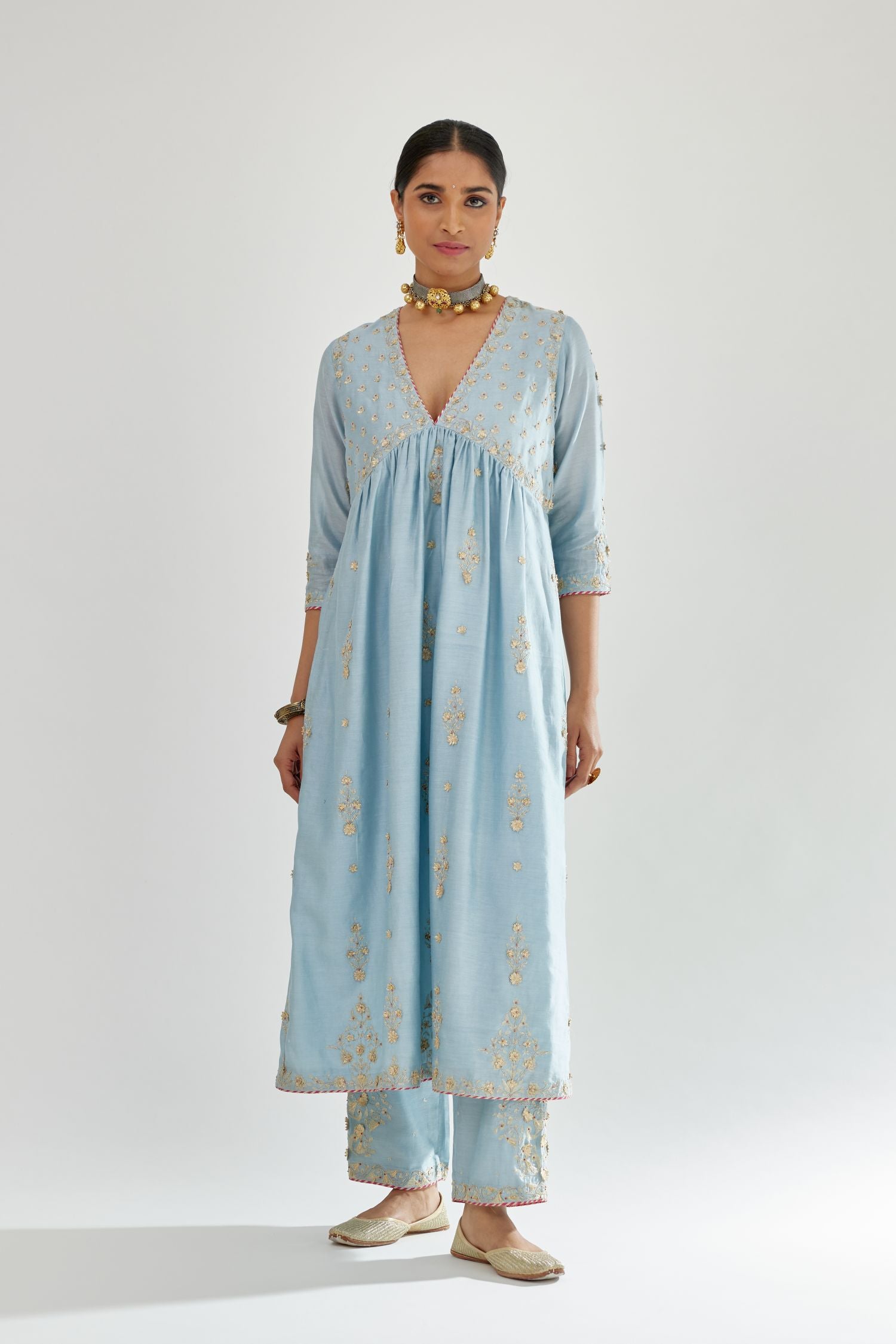 Blue silk chanderi kurta-dress set with zari, dori and gota embroidery, highlighted with contrast bead work.