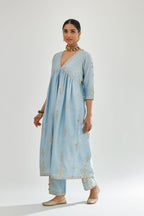 Blue silk chanderi kurta-dress set with zari, dori and gota embroidery, highlighted with contrast bead work.