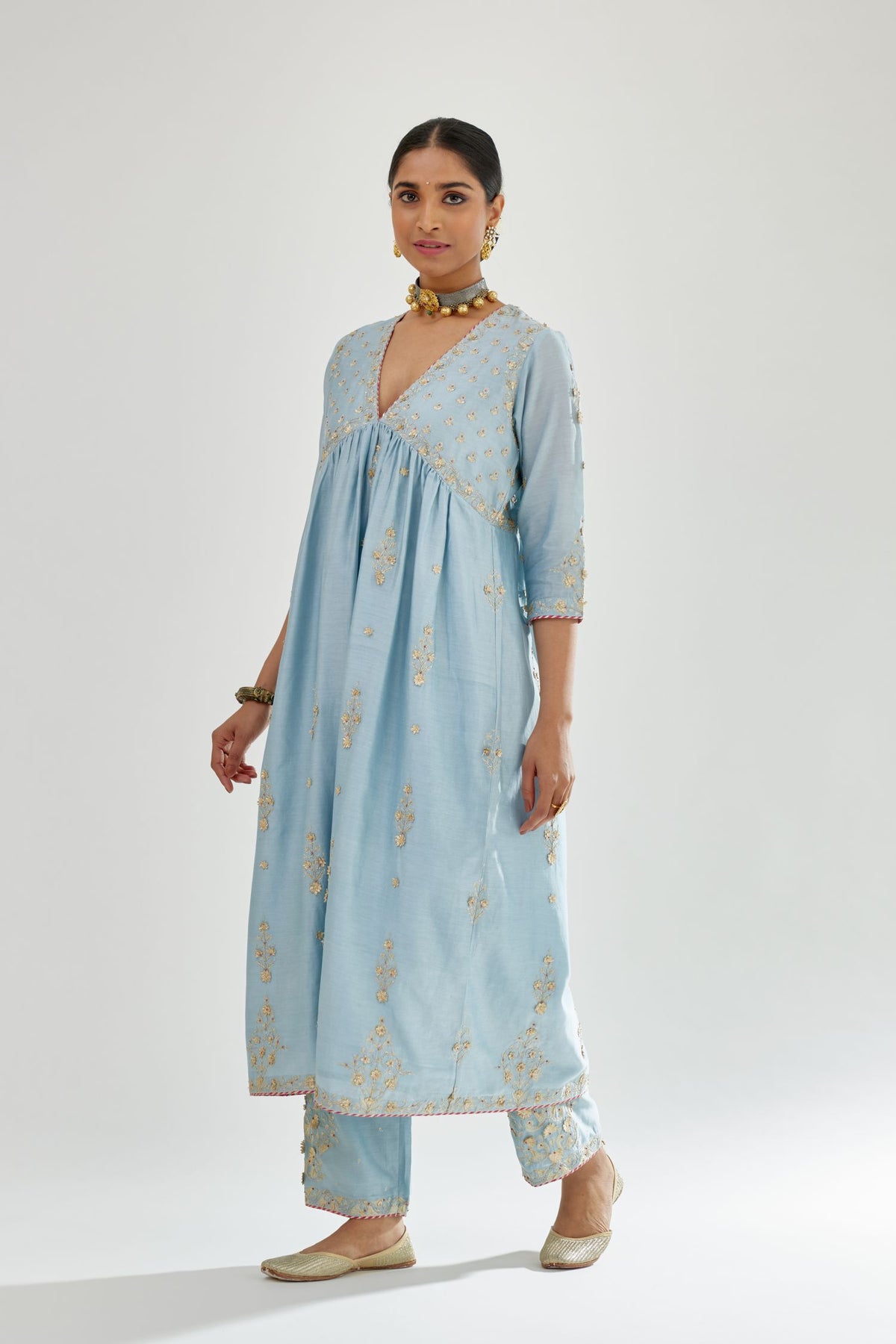 Blue silk chanderi kurta-dress set with zari, dori and gota embroidery, highlighted with contrast bead work.