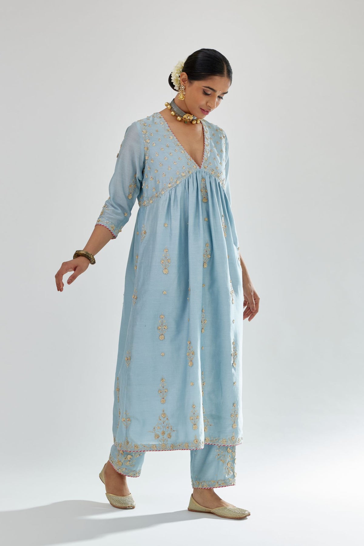 Blue silk chanderi kurta-dress set with zari, dori and gota embroidery, highlighted with contrast bead work.