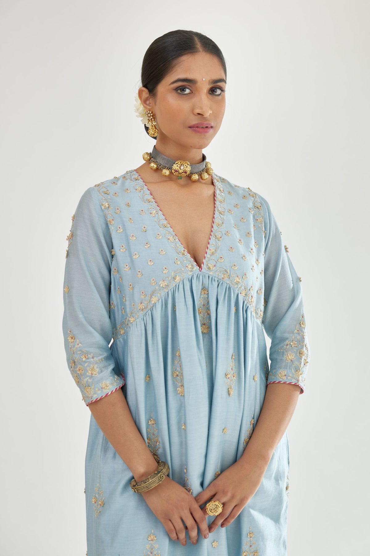 Blue silk chanderi kurta-dress set with zari, dori and gota embroidery, highlighted with contrast bead work.