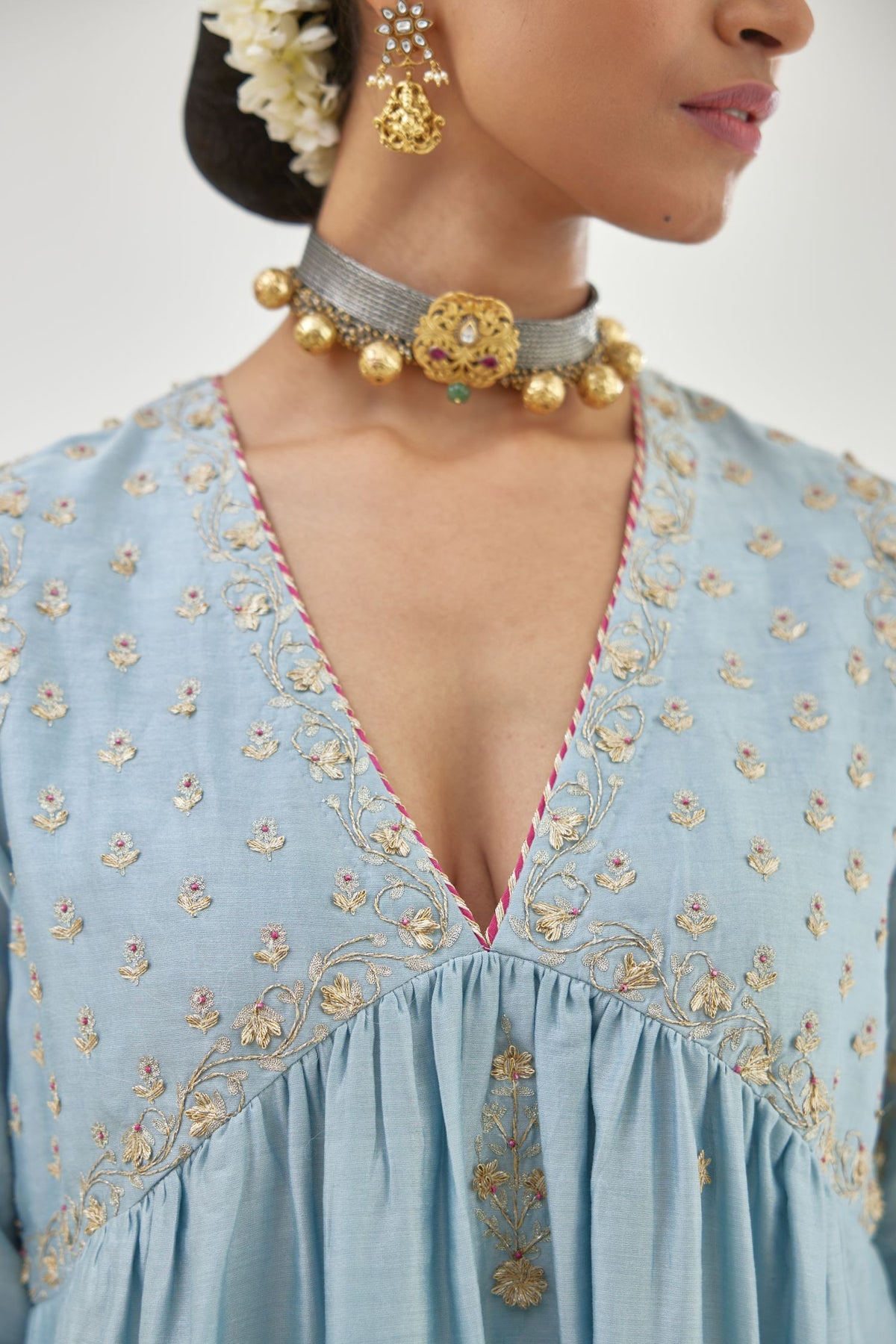 Blue silk chanderi kurta-dress set with zari, dori and gota embroidery, highlighted with contrast bead work.