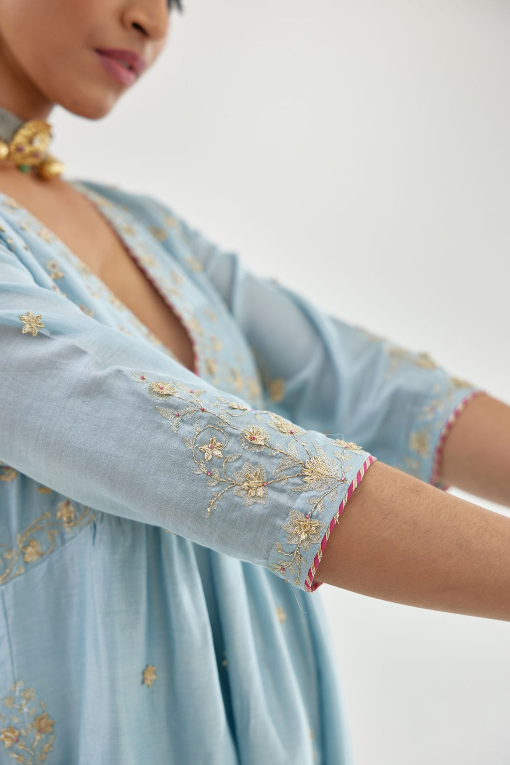 Blue silk chanderi kurta-dress set with zari, dori and gota embroidery, highlighted with contrast bead work.