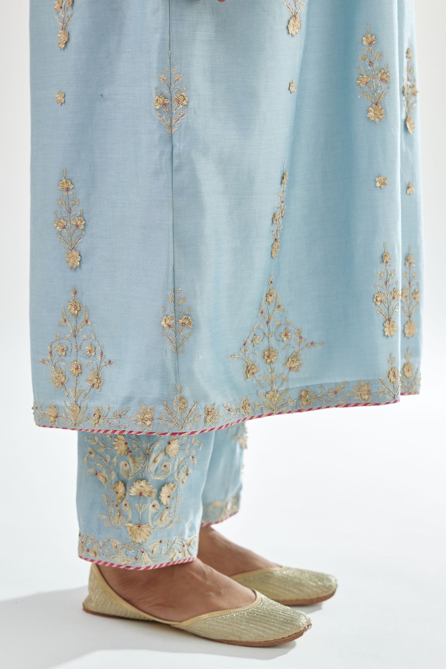 Blue silk chanderi kurta-dress set with zari, dori and gota embroidery, highlighted with contrast bead work.