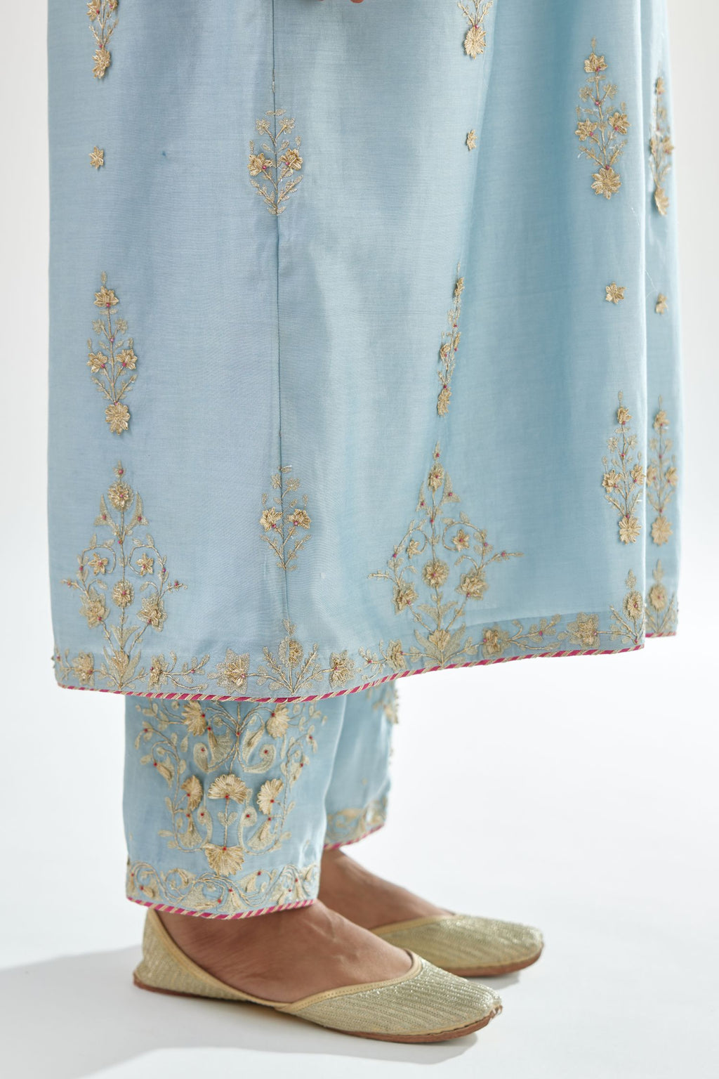 Blue silk chanderi kurta-dress set with zari, dori and gota embroidery, highlighted with contrast bead work.