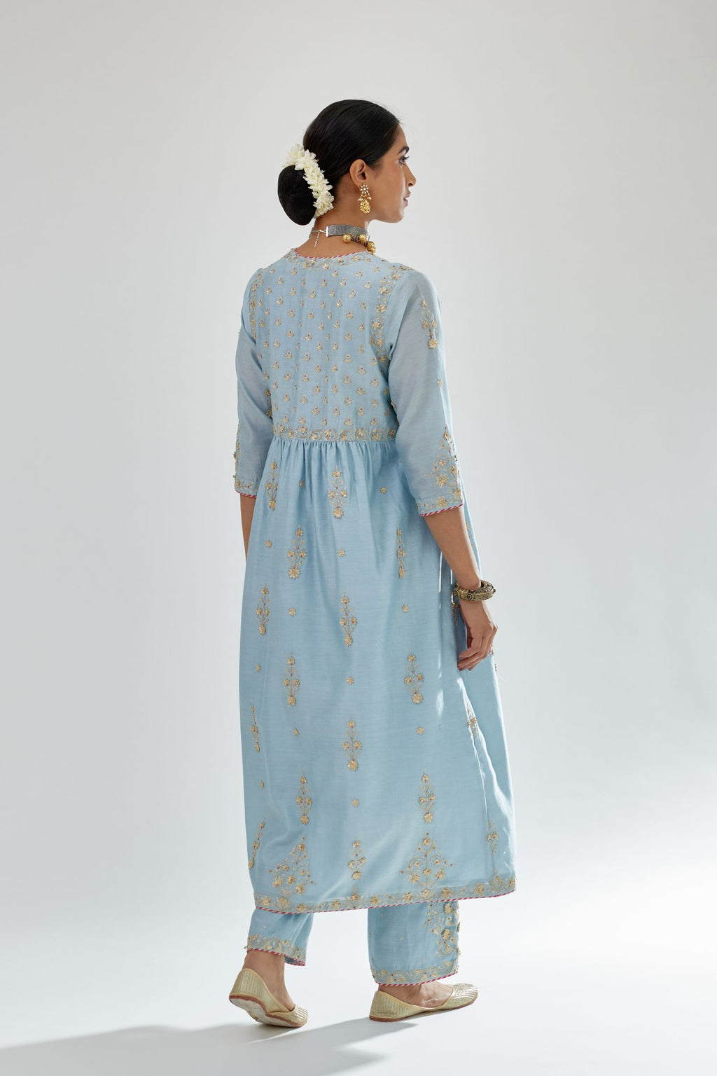 Blue silk chanderi kurta-dress set with zari, dori and gota embroidery, highlighted with contrast bead work.