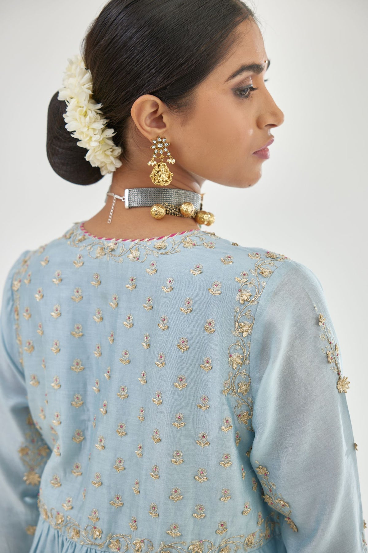 Blue silk chanderi kurta-dress set with zari, dori and gota embroidery, highlighted with contrast bead work.
