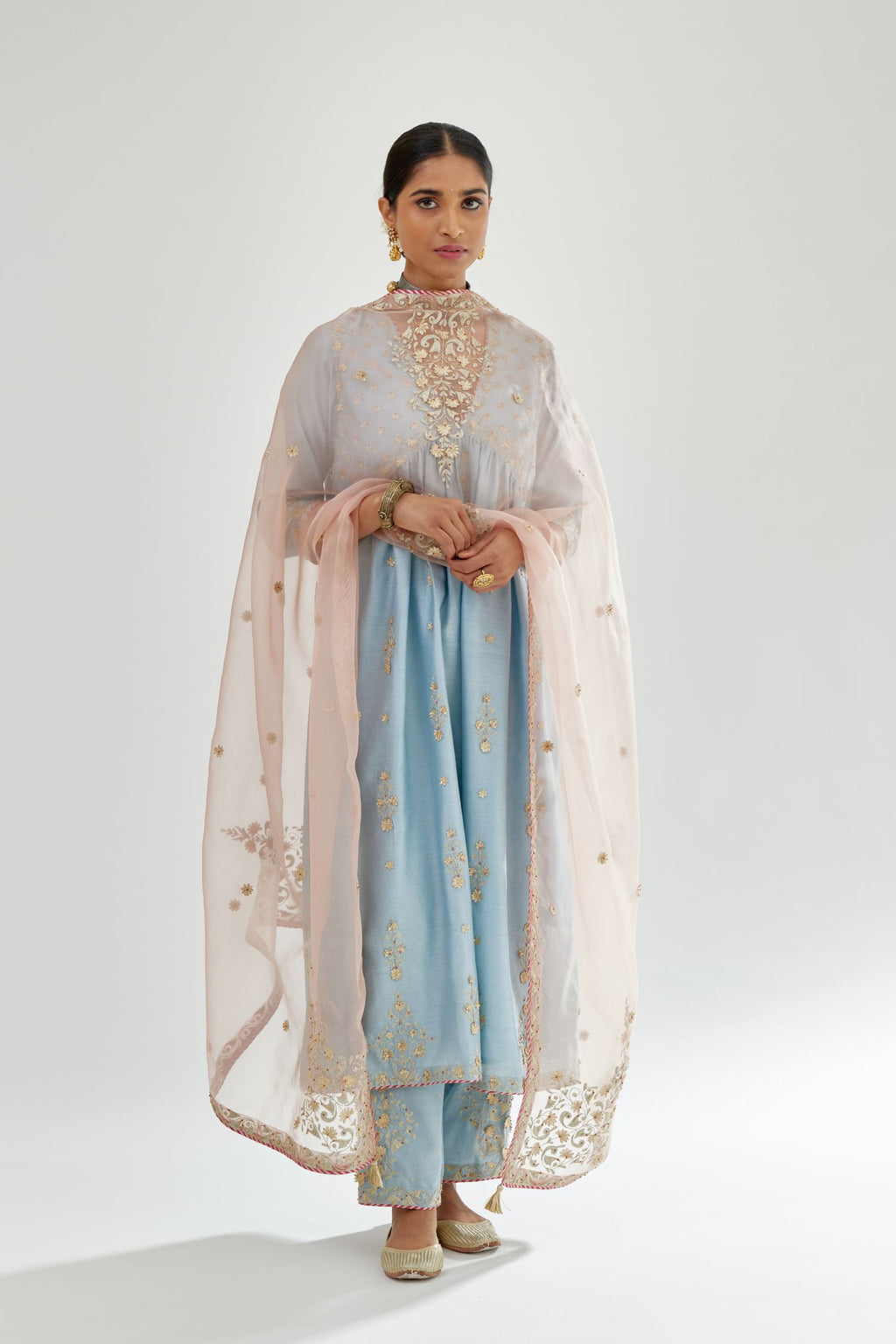 Blue silk chanderi kurta-dress set with zari, dori and gota embroidery, highlighted with contrast bead work.