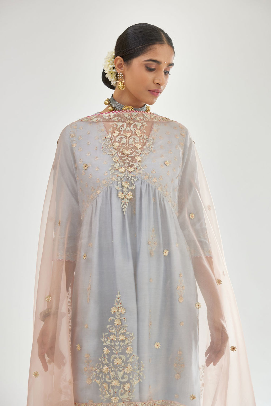 Blue silk chanderi kurta-dress set with zari, dori and gota embroidery, highlighted with contrast bead work.