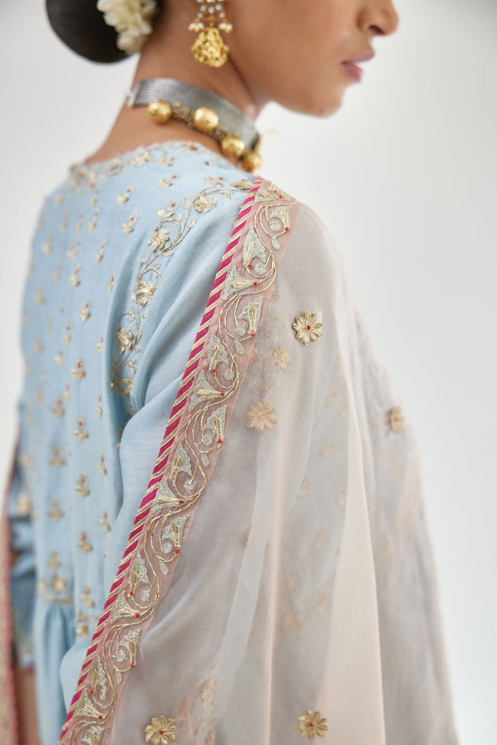 Blue silk chanderi kurta-dress set with zari, dori and gota embroidery, highlighted with contrast bead work.